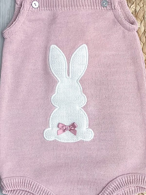 Close up of blush pink bunny romper.